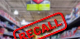 Blurred store aisle with "RECALL" stamp overlay.