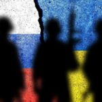 Soldiers silhouettes over divided flags of Russia Ukraine