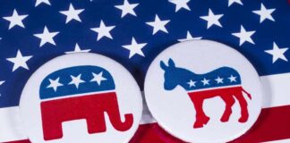 Republican and Democrat symbols on American flag.