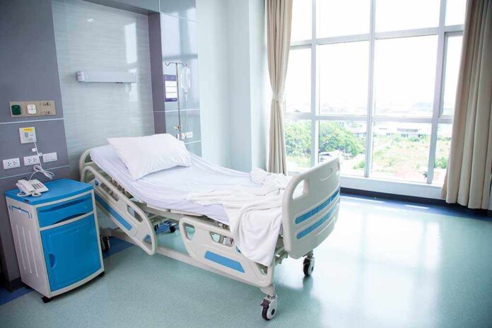 1406833052 featured image Empty hospital room with a single bed.