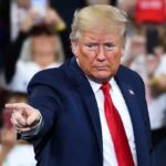 Sen. Rosen Challenges Trump’s Birthright Citizenship Policies with New Bill Man in suit pointing at rally audience