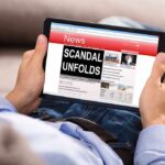 Monica Lewinsky Calls for Accountability in Historic Political Scandal Person reading tablet with headline "Scandal Unfolds".