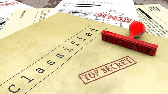 1099380299 featured image Classified documents with top secret stamps and stamp