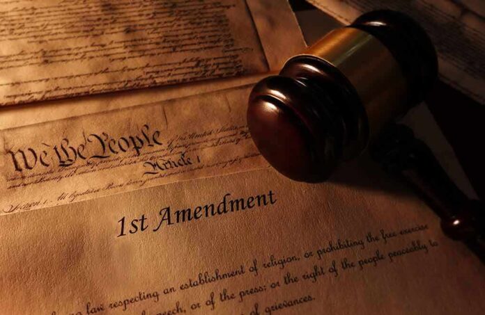 First Amendment document with gavel and Constitution background.