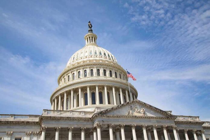 2249422291 featured image US Capitol Building with American flag flying