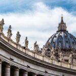 Large dome with statues on curved building