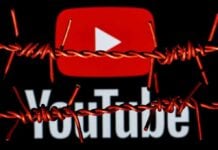 YouTube logo behind barbed wire lines