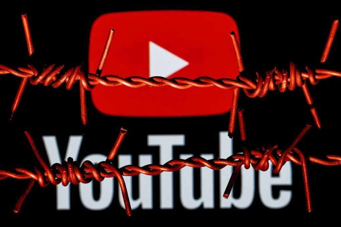 2063278598 featured image YouTube logo behind barbed wire lines