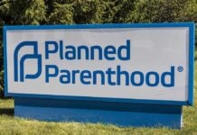 Planned Parenthood sign with blue logo and text