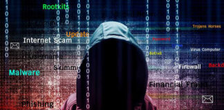 Hooded figure with cybersecurity terms and binary code background
