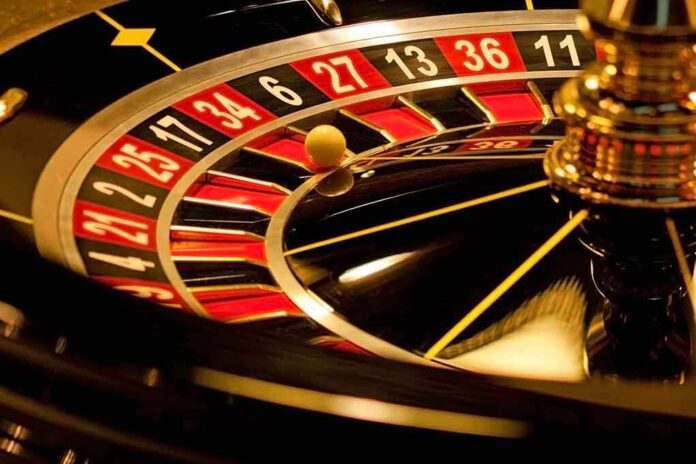 Close-up of a roulette wheel with a spinning ball