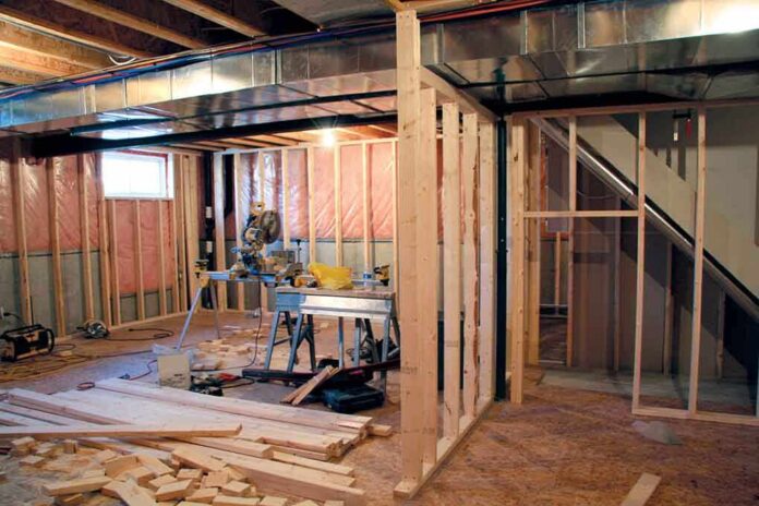 shutterstock_11669740.jpg Interior of a basement under construction with wooden frames and tools