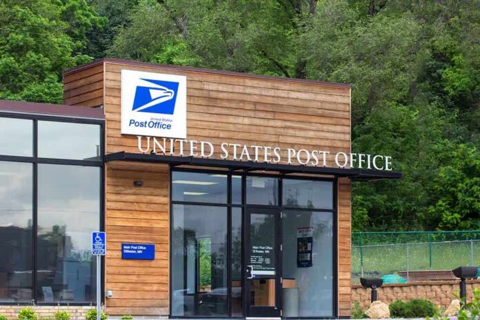 Exterior view of a modern United States Post Office building surrounded by greenery
