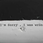 HOMAN ADMITS Mistakes: Shocking BLUNDERS Im sorry, I was wrong text on wall.