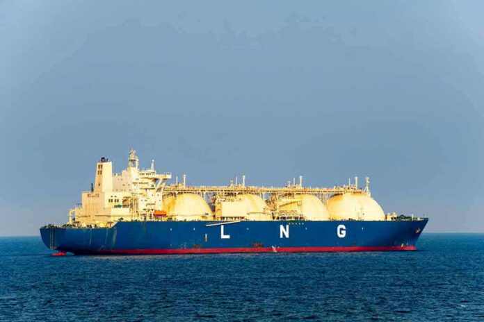 LNG tanker ship sailing on open sea.