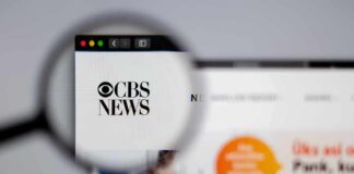 Magnifying glass focusing on CBS News logo on a website