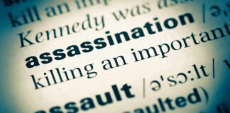 Teen MURDERS Parents To Assassinate Trump Close-up of a dictionary page showing the definition of 'assassination'