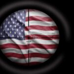 View of the American flag through a sniper scope