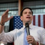Marco Rubio delivering a speech with a microphone