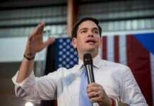 Marco Rubio delivering a speech with a microphone