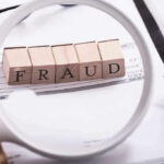 Trump’s DOJ to AXE Fraud Charges? Fraud blocks under magnifying glass on invoices.