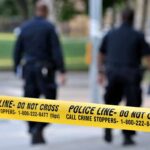 Campus Horror: ASSAULT Shocker Police officers walking past caution tape at a crime scene