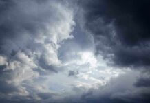 Dramatic clouds in a stormy sky with varying shades of gray