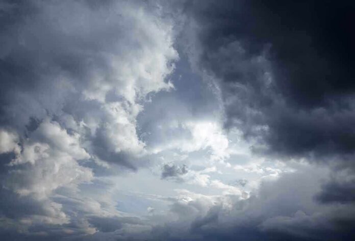 shutterstock_163050257 Dramatic clouds in a stormy sky with varying shades of gray