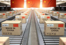 Supply Chain: China Expands Export Controls Boxes labeled Made in China on conveyor belt