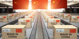 Boxes labeled Made in China on conveyor belt