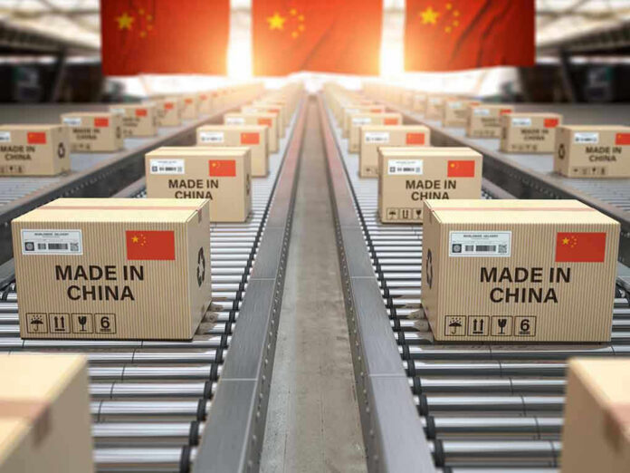 1463791133 Boxes labeled Made in China on conveyor belt