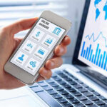 $1,000 for Kids: Launches New Wealth Program Person using smartphone for online banking.