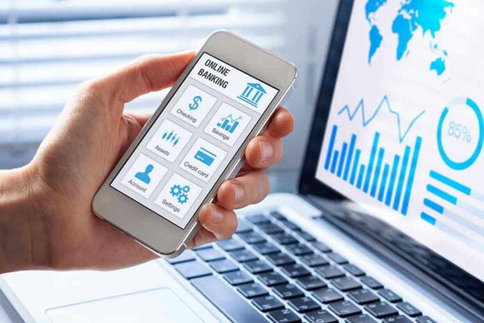 599904188 Person using smartphone for online banking.