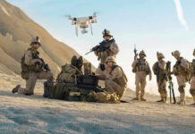 Ukraine Drone Tech Expands to Taiwan Soldiers operating a drone in a desert environment.