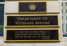 Congress Rolls 60 Veterans Bills Into One Giant Package Department of Veterans Affairs building sign with quote.