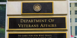 Congress Rolls 60 Veterans Bills Into One Giant Package Department of Veterans Affairs building sign with quote.