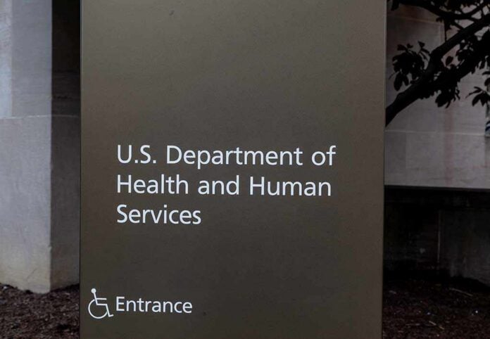 Sign for the U.S. Department of Health and Human Services with an entrance indication
