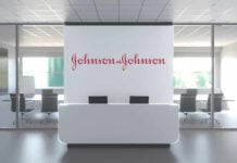 Most Mothers Say Parenthood Cost Them Career Growth Office lobby with Johnson & Johnson logo.