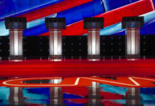 Clock Wars Heat Up In Congress Four debate podiums on a CNN stage background.