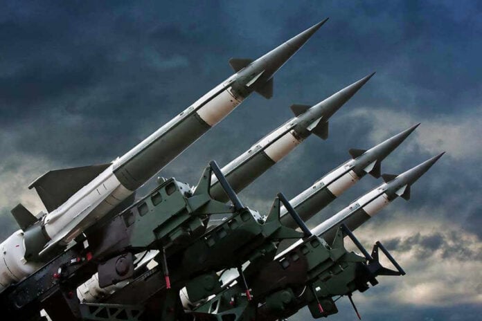 71240899 Four rockets pointed towards the sky.
