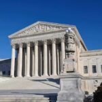 Spyware Bombshell: Greek Court to Hear Landmark Case The Supreme Court building with large columns and a clear blue sky