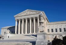 Spyware Bombshell: Greek Court to Hear Landmark Case The Supreme Court building with large columns and a clear blue sky