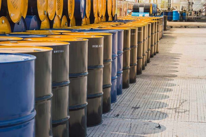 Rows of oil barrels in a storage facility