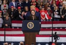 Viral Clip Reignites Debate Over Whether Character Matters in Politics speaker at presidential podium during rally