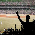 Historic Victory, Massive Controversy: Team USA Moves On Crowd of fans cheering at a baseball game in a stadium