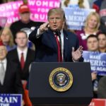 Trump’s ‘Beautiful Girls’ Crime Claim Sparks Backlash politician speaking at a rally podium