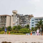 Tsunami Sirens BLARE After 7.7 Quake in Indonesia Partially collapsed beachfront condominium building