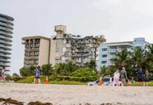 Partially collapsed beachfront condominium building