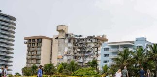 Partially collapsed beachfront condominium building
