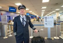 WHAT?! Commercial Pilot On Meth During Flight! Airline pilot standing in airport check-in area with rolling bag